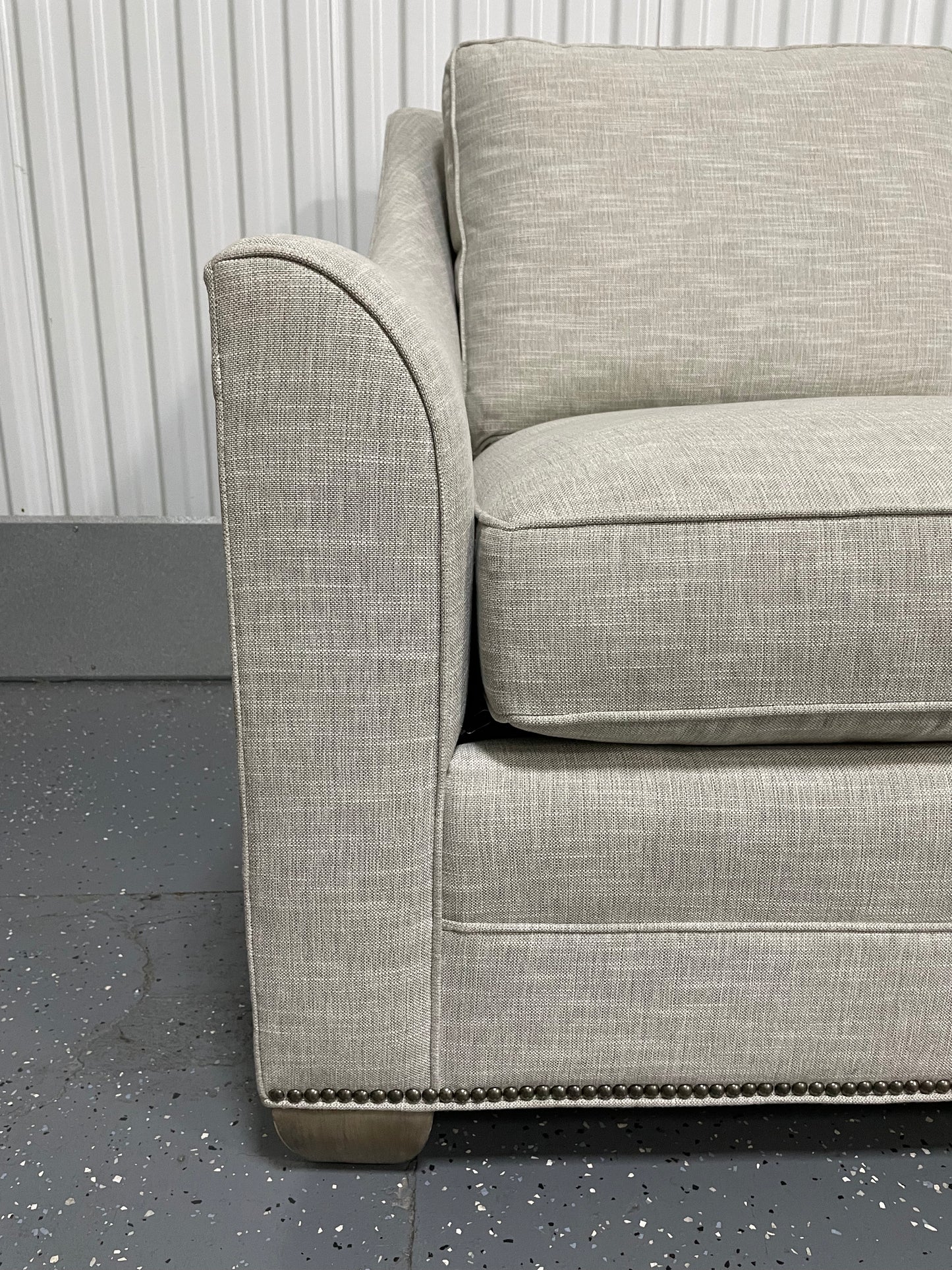 Natural Loveseat with Nail Head Trim