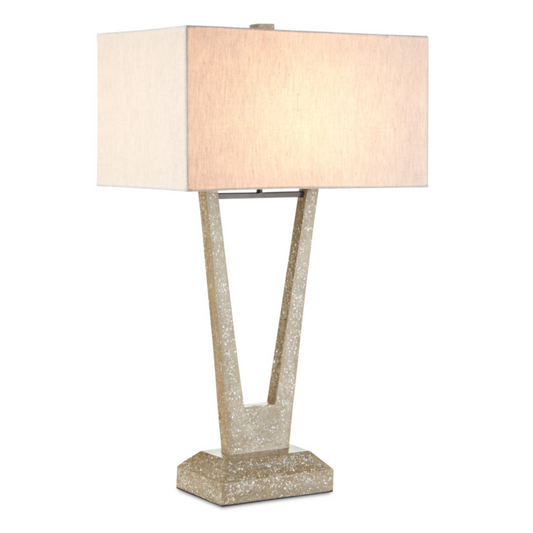 Elegant Tide Lamp with a concrete base embedded with crushed seashells and a rectangular fabric shade, available at Haven Design Center in St. Petersburg for modern coastal home decor.