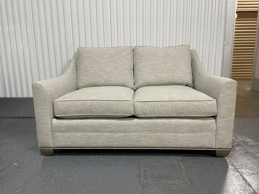Natural Loveseat with Nail Head Trim