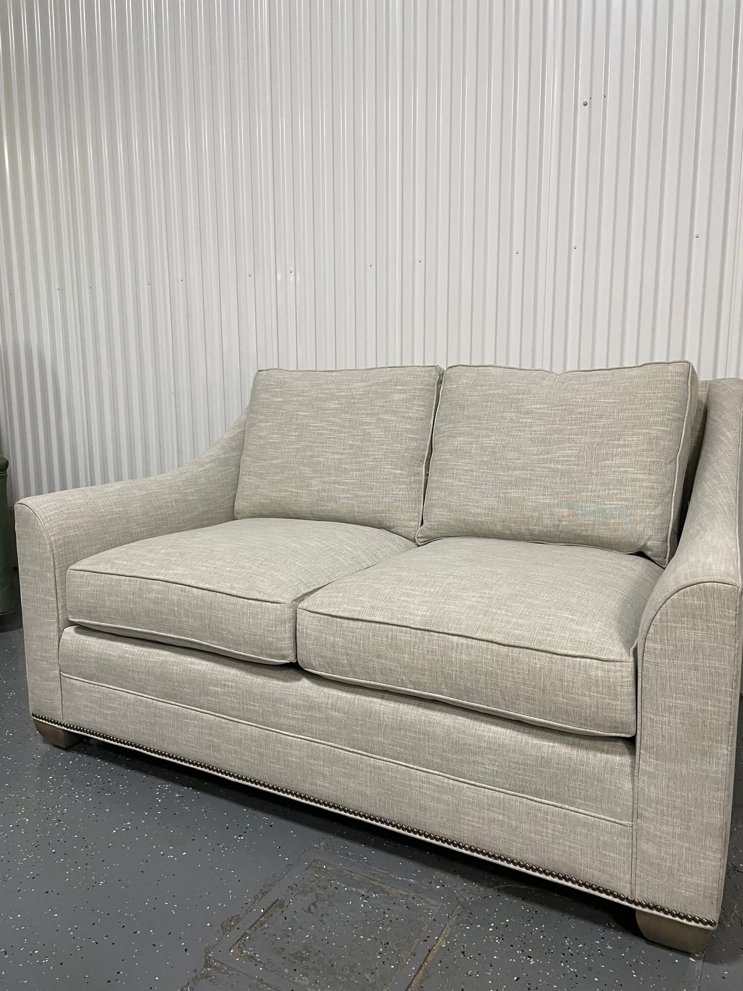 Natural Loveseat with Nail Head Trim